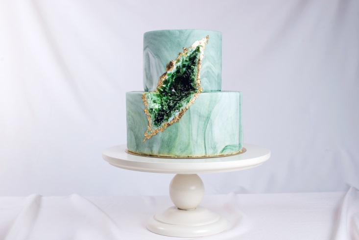 A green geode wedding cake