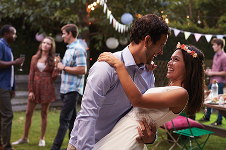 First wedding dance man dipping woman while dancing